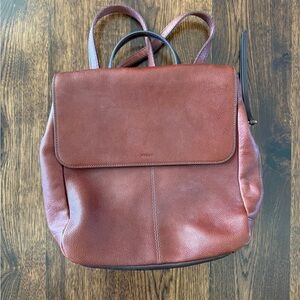 Brown leather fossil backpack purse. In new condition. Has adjustable straps.